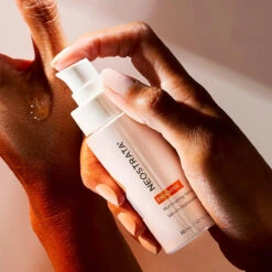 NeoStrata Enlighten Illuminating Serum -Cosmetic Care Store Neostrata Enlighten Illuminating Serum Hand
